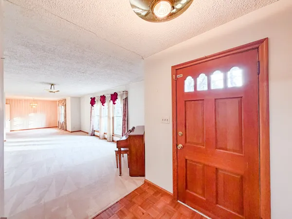 a view of entryway with stairs