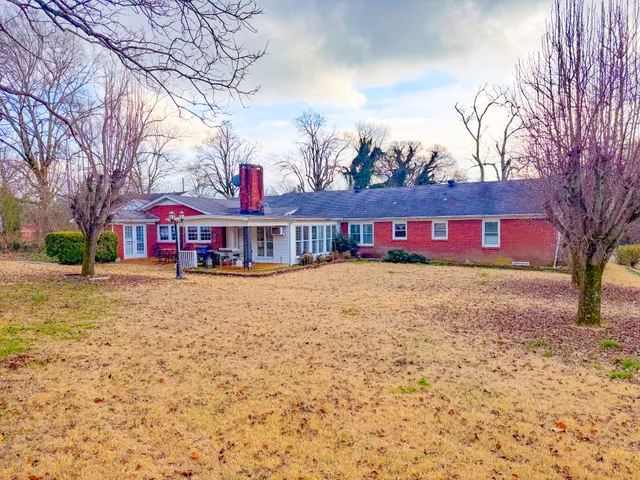 a living room with furniture or couch and a flat screen tv