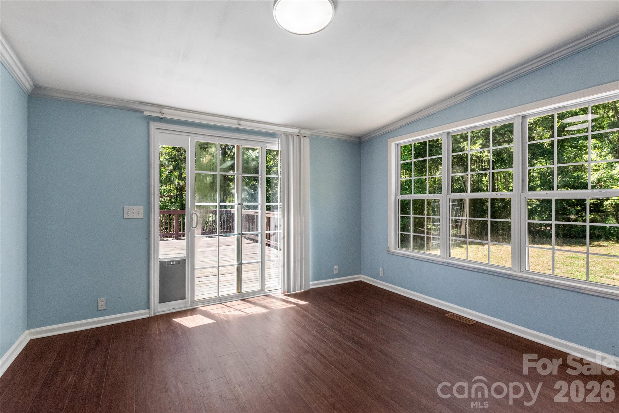 434 Rutledge Drive Catawba, SC 29704 - Photo 17 of 39 a view of an empty room with wooden floor and a window