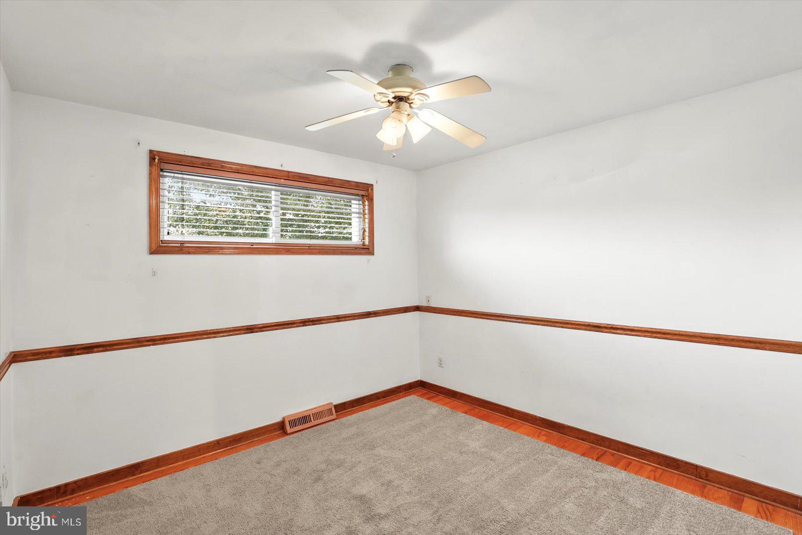 2453 Brookside Lane York, PA 17402 - Photo 20 of 40 a view of an empty room with a window