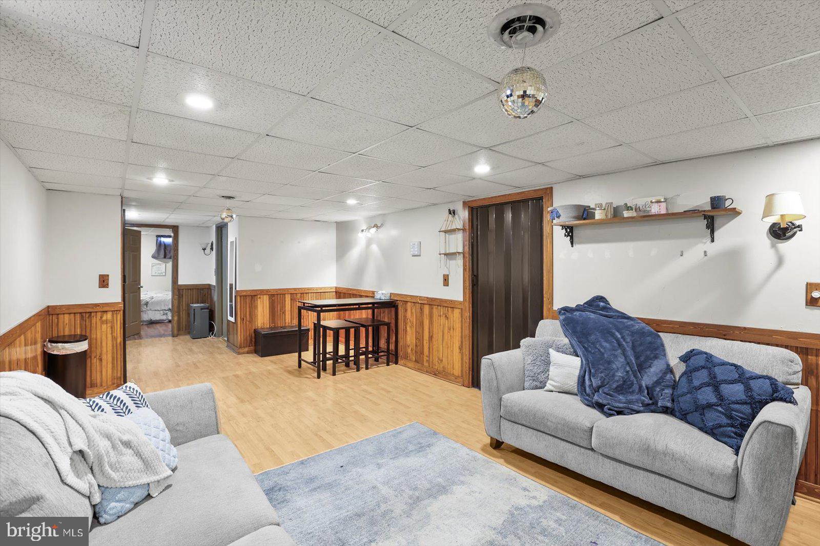 2453 Brookside Lane York, PA 17402 - Photo 30 of 40 a living room with furniture and kitchen view