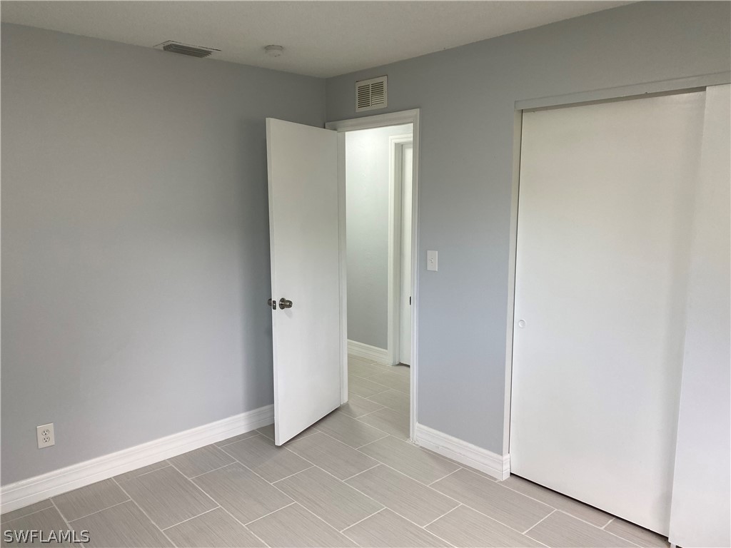 2316 Lotus Road Fort Myers, FL 33905 - Photo 23 of 35 a view of an empty room