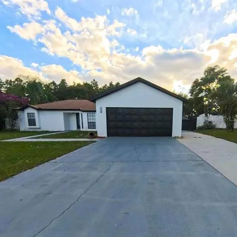 a house view with a garden space