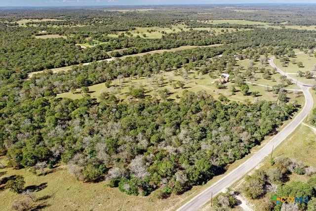 a view of a yard with an outdoor space