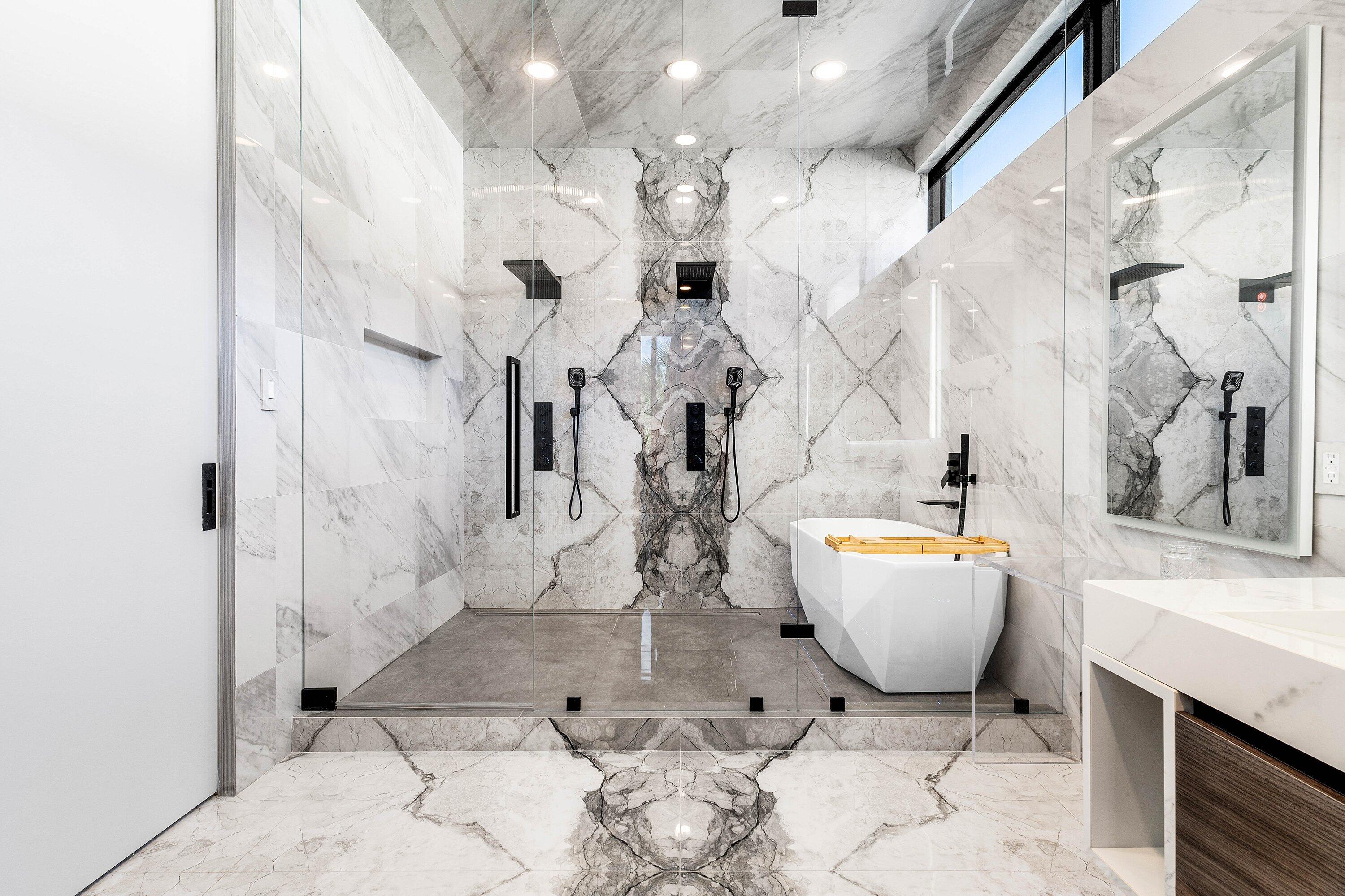 245 Northeast 6th Court Boca Raton, FL 33432 - Photo 30 of 84 a living room with patio furniture and a chandelier