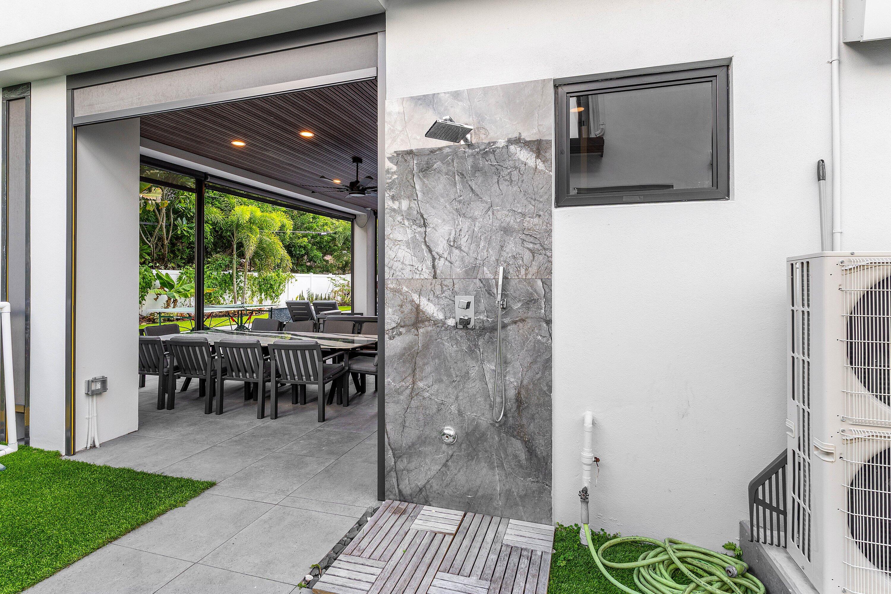 245 Northeast 6th Court Boca Raton, FL 33432 - Photo 55 of 84 a view of living room filled with furniture and a window