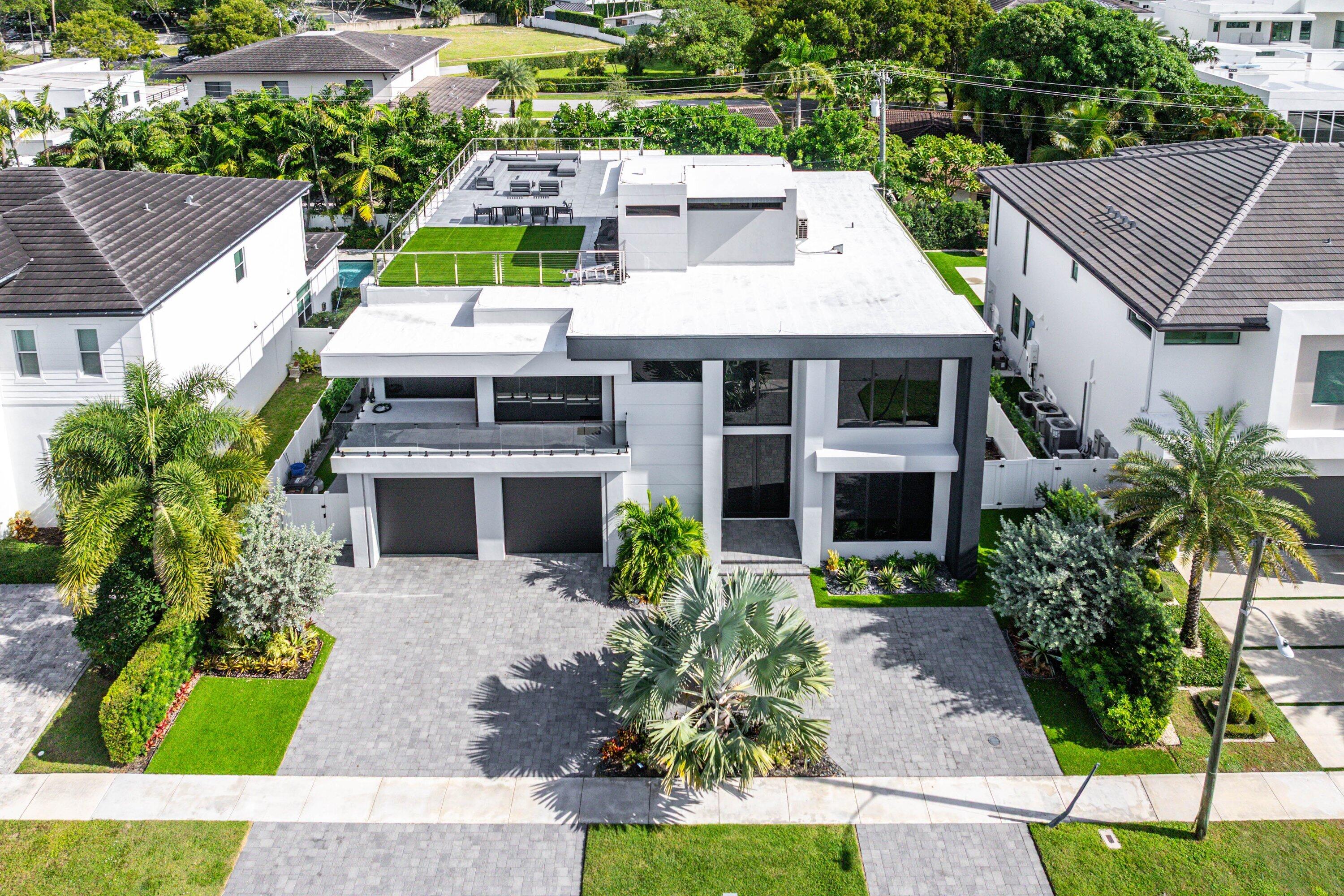 245 Northeast 6th Court Boca Raton, FL 33432 - Photo 56 of 84 a aerial view of a house with a yard