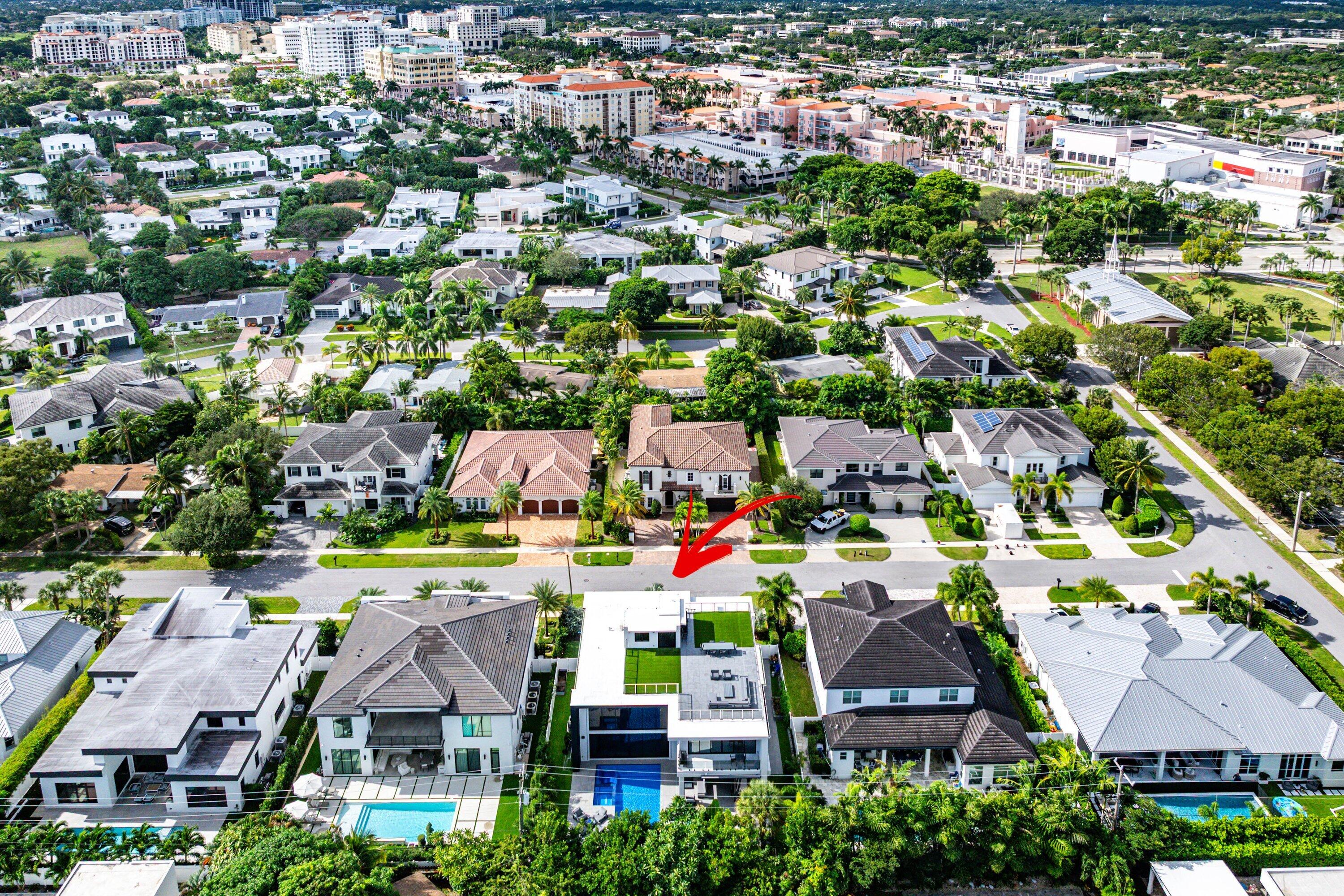 245 Northeast 6th Court Boca Raton, FL 33432 - Photo 65 of 84 an aerial view of residential houses with outdoor space and swimming pool