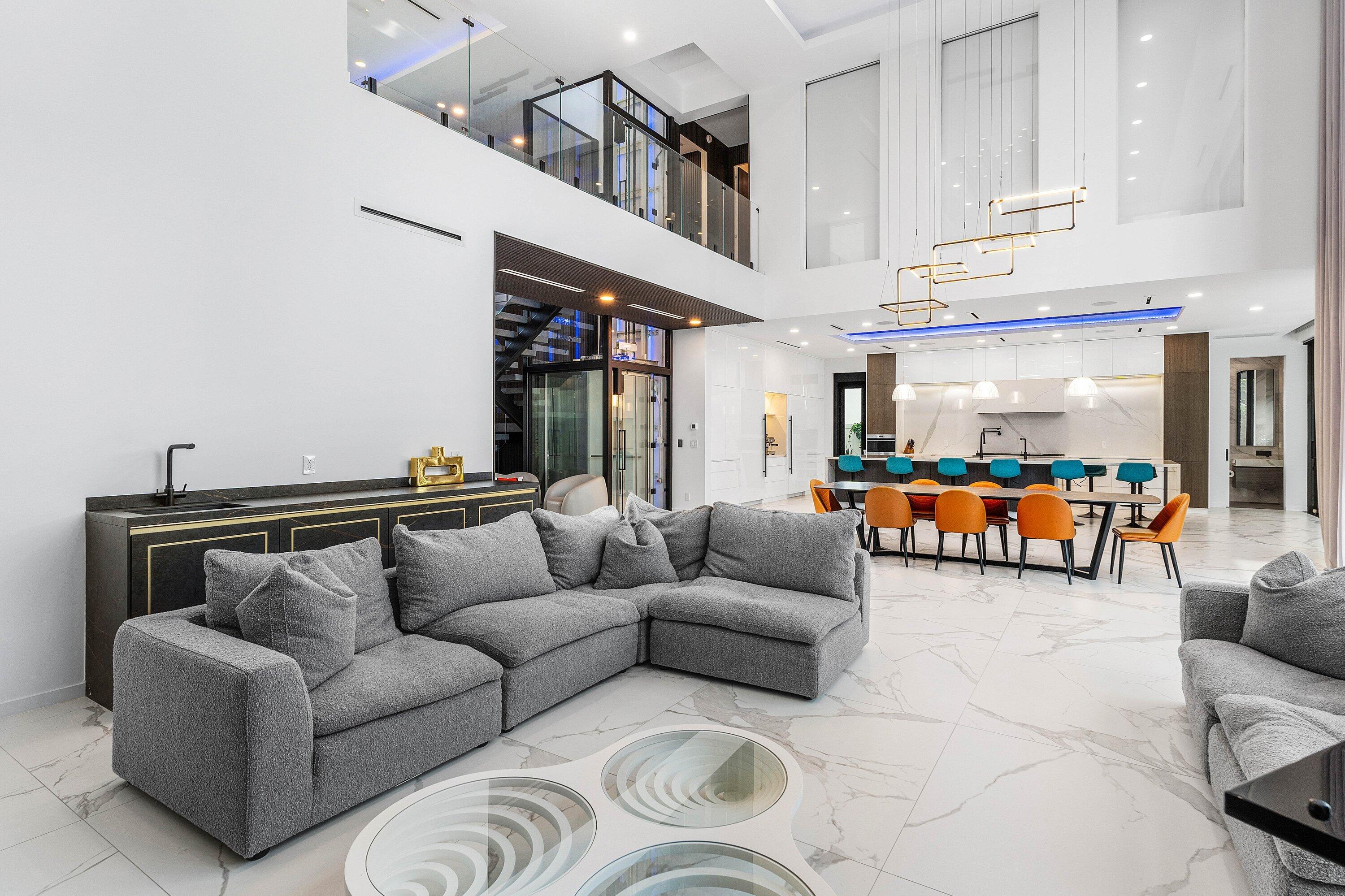 245 Northeast 6th Court Boca Raton, FL 33432 - Photo 10 of 84 a living room with furniture and a flat screen tv