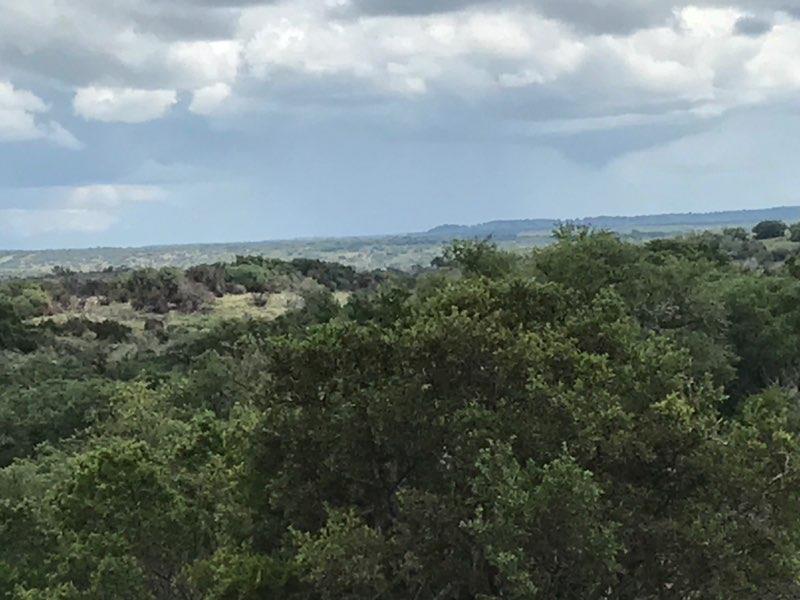 17167 Mill Creek Road Mason, TX 76856 - Photo 14 of 14 a view of a big yard of grass and basketball court