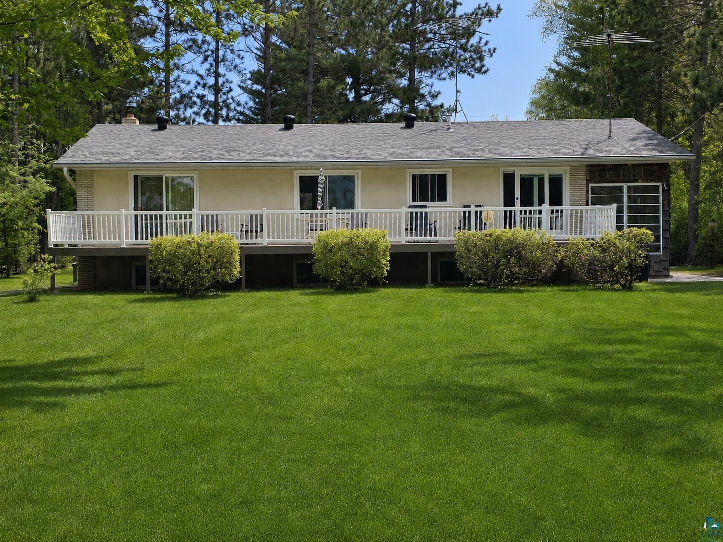 3975 Long Lake Shores Road Eveleth, MN 55734 - Photo 5 of 84 Ranch-style residence featuring a prominent front deck with white railings