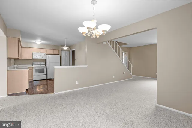 a view of a kitchen with a sink