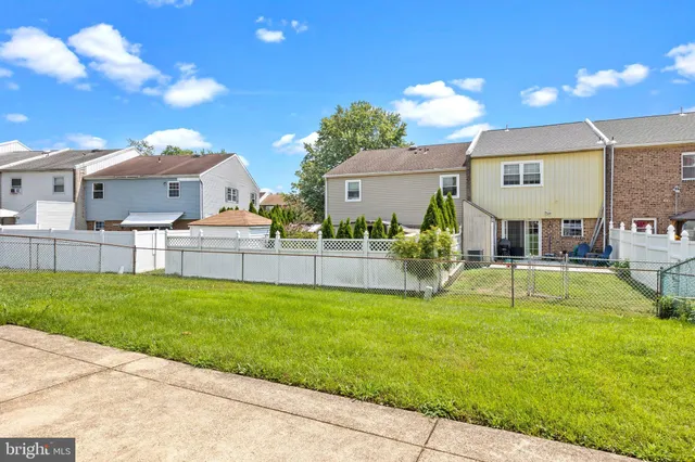 a view of house with a swimming pool