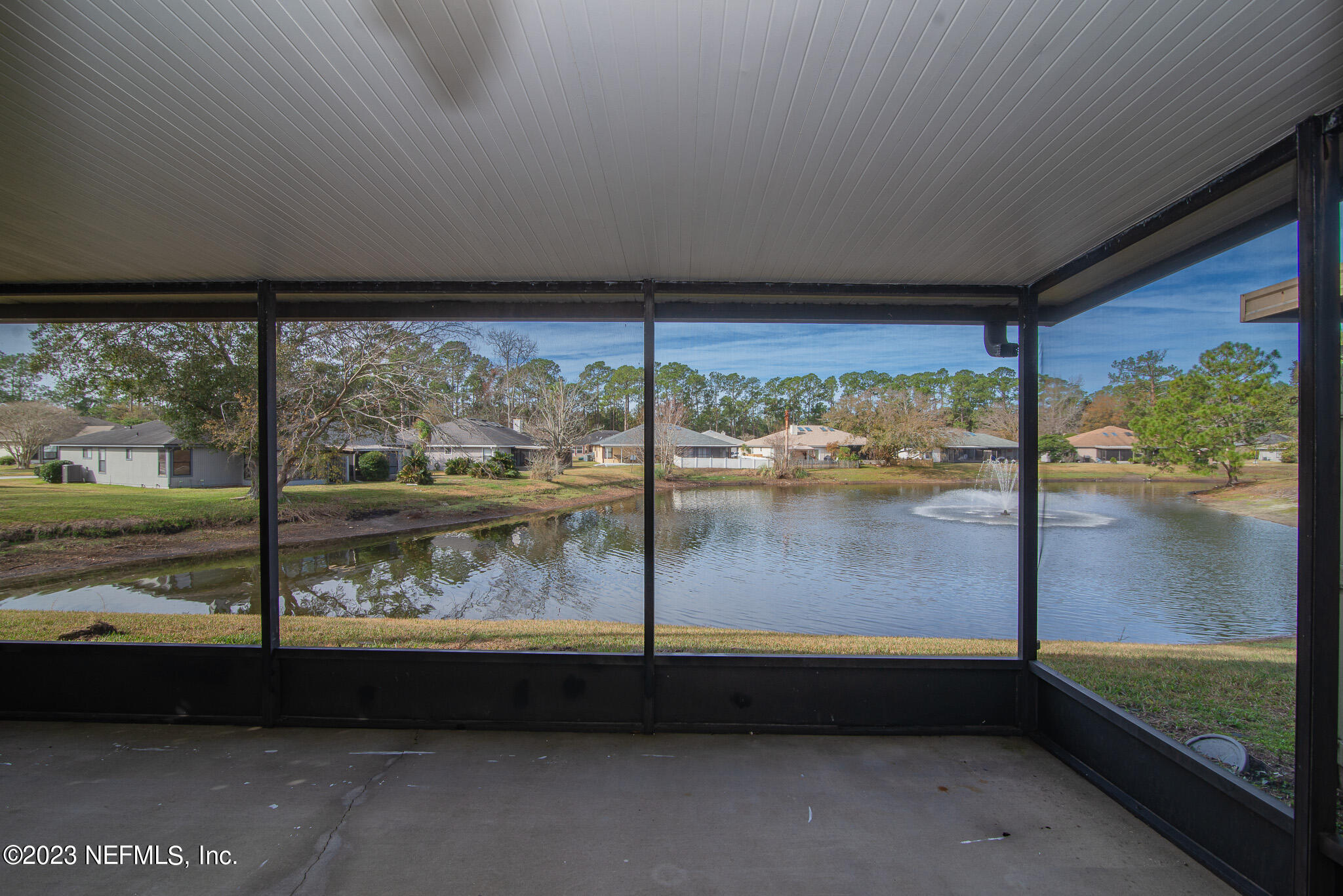 2406 Bitternut Way Jacksonville, FL 32246 - Photo 23 of 29 Screened Patio with Pond View