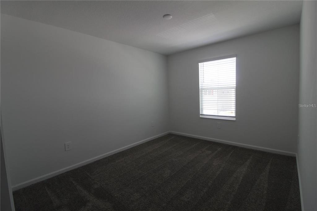 263 Hayley Street Lake Wales, FL 33859 - Photo 12 of 22 an empty room with a window