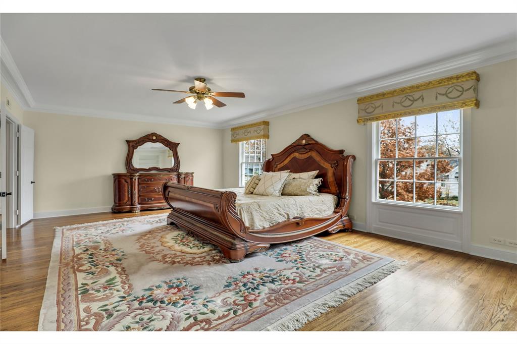 1102 Howell Street McKinney, TX 75069 - Photo 22 of 40 Cavernous primary bedroom is roughly 25 x 15 feet! There is a huge sitting area between bed and fireplace. (second level)