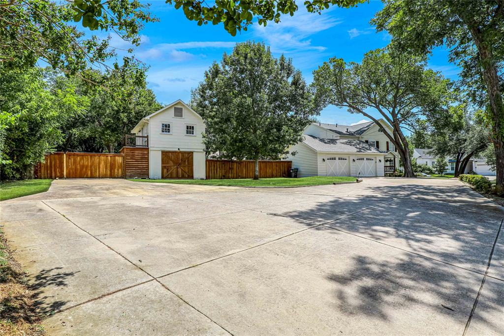1102 Howell Street McKinney, TX 75069 - Photo 29 of 40 Pictured to left is detached guest house, which has large workshop underneath! The workshop is not in photos. It was a carriage house many years ago!