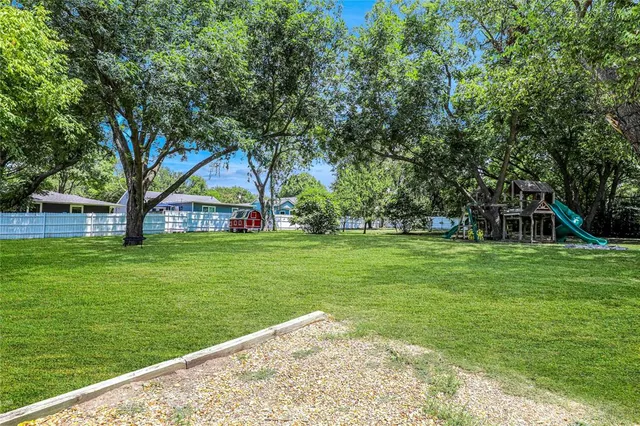 a view of a wooden deck with a bench