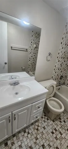 a view of a balcony with trees