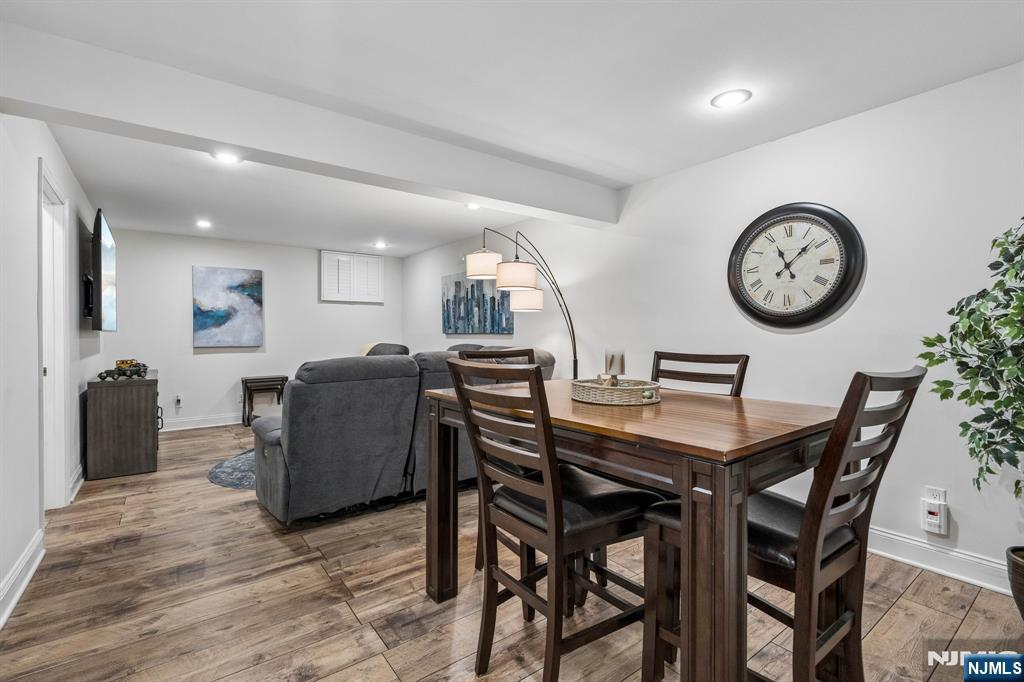 1 Beekman Hill Road Caldwell, NJ 07006 - Photo 26 of 37 a view of a dining room with furniture and wooden floor