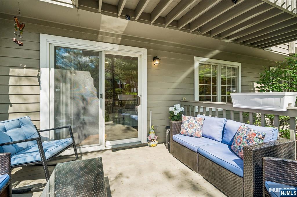 1 Beekman Hill Road Caldwell, NJ 07006 - Photo 35 of 37 a balcony with furniture and a potted plant