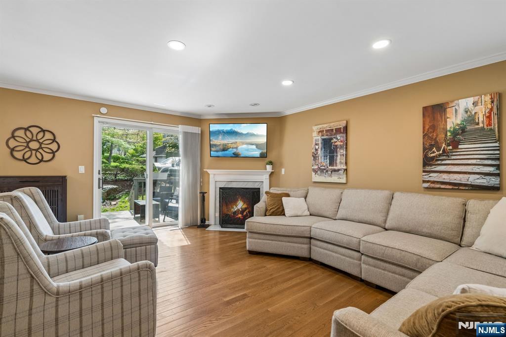 1 Beekman Hill Road Caldwell, NJ 07006 - Photo 5 of 37 a living room with furniture and a fireplace