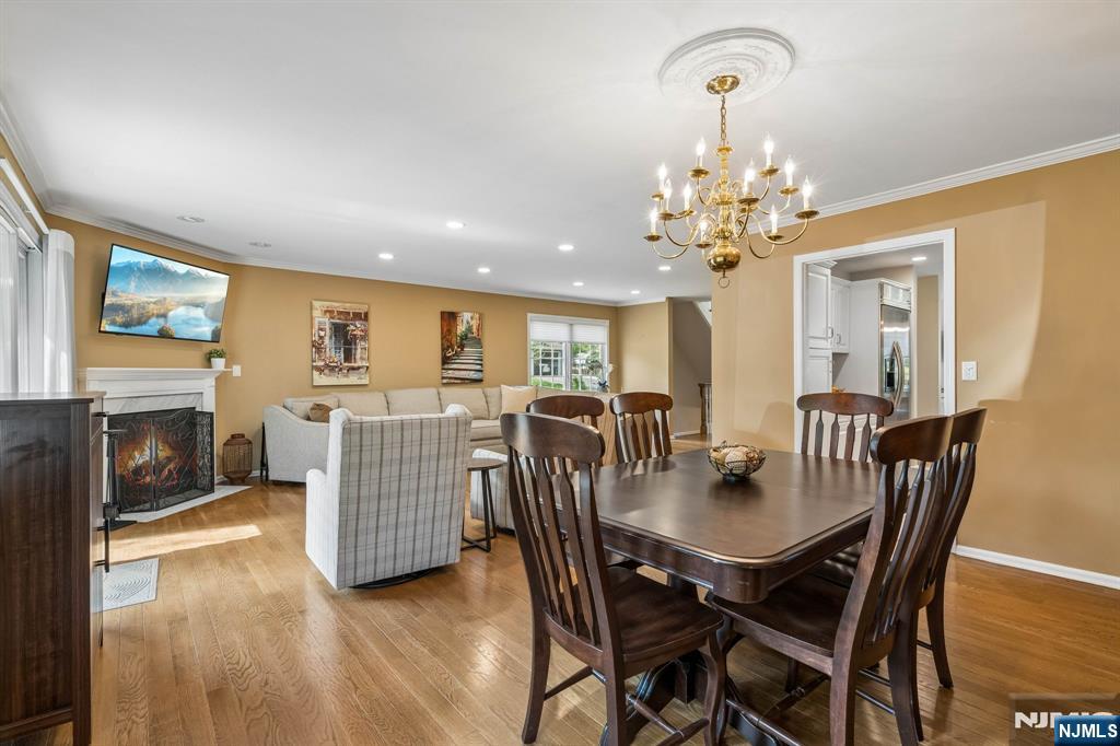 1 Beekman Hill Road Caldwell, NJ 07006 - Photo 10 of 37 a view of a dining room with furniture and chandelier