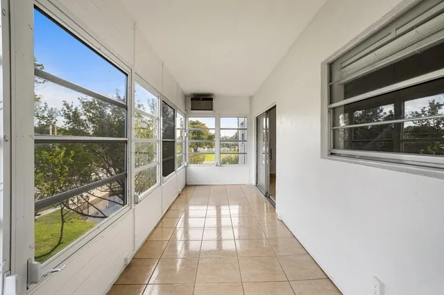 a hallway with a large window