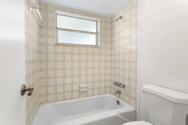 a bathroom with a bathtub