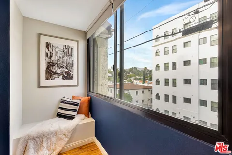 a view of a large window with a living room
