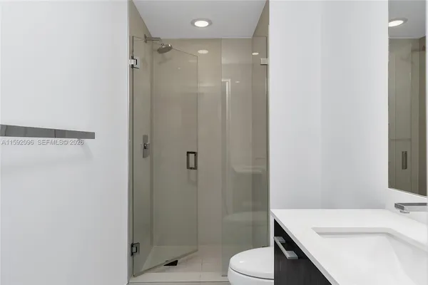 a view of storage and utility room with washer and dryer