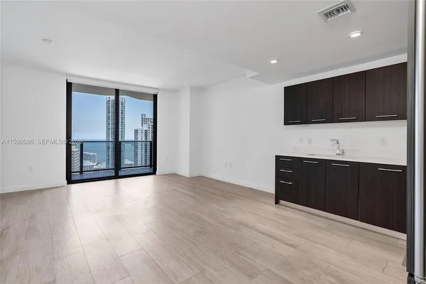 a living room with a flat screen tv