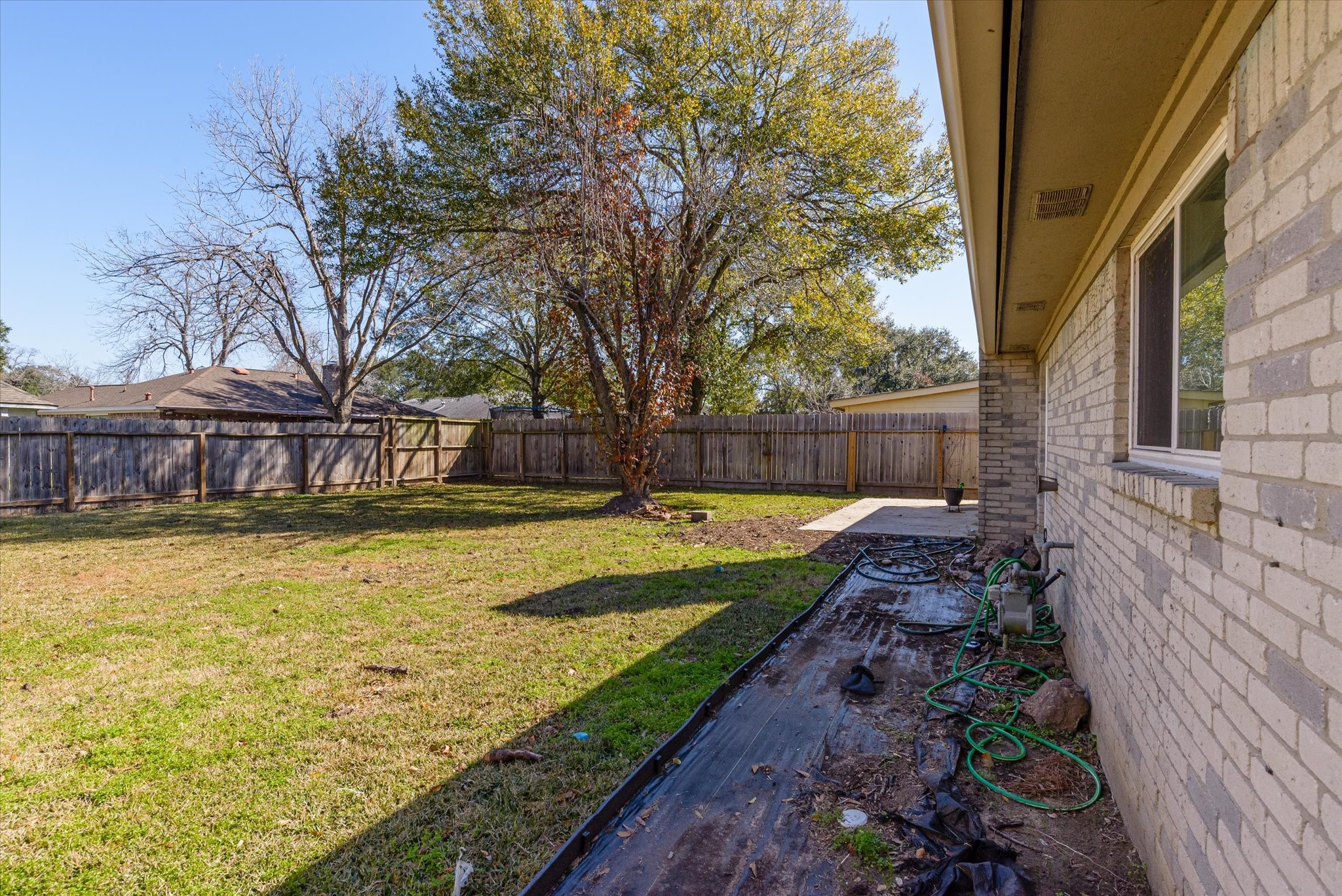 4905 Woodway Avenue Rosenberg, TX 77471 - Photo 26 of 30 a view of swimming pool with seating area and trees around