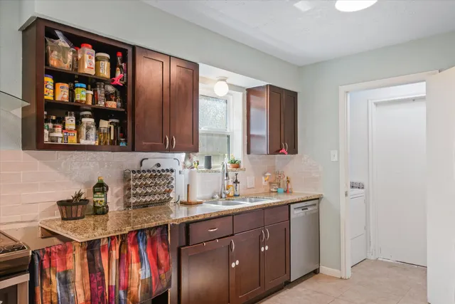 a bathroom with a sink double vanity and a two mirror