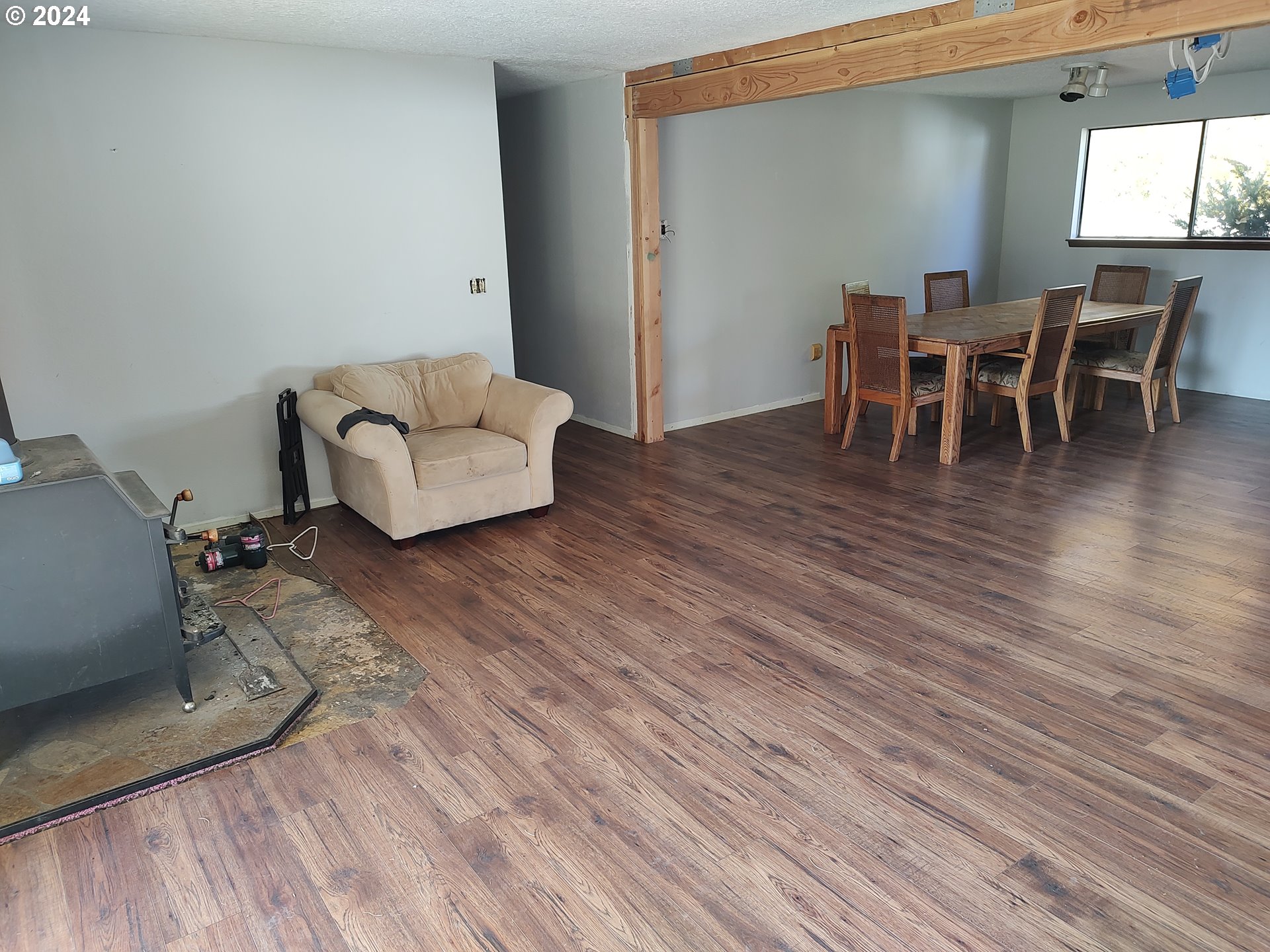 75657 Upper Diamond Lane Wallowa, OR 97885 - Photo 18 of 21 a living room with furniture and a wooden floor