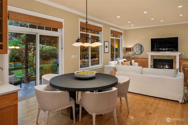a living room with fireplace furniture and a flat screen tv