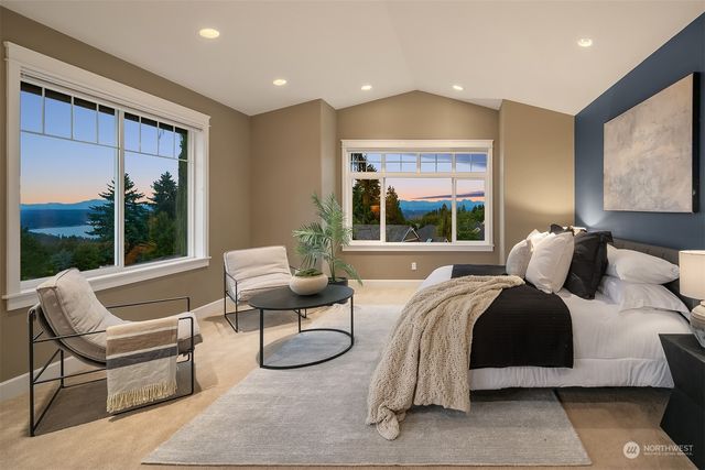 a bed room with a bed and a couch