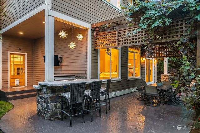 a dining room with furniture and windows