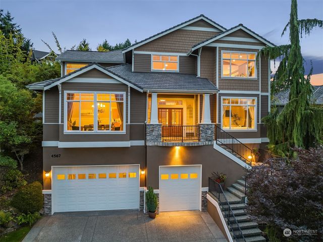 a front view of a house with swimming pool