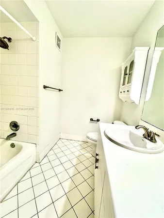a bathroom with a sink and a bathtub
