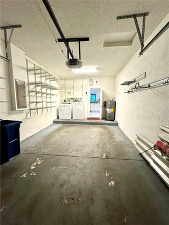 a spacious bathroom with a double vanity sink and a mirror