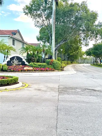 a view of road and car parked