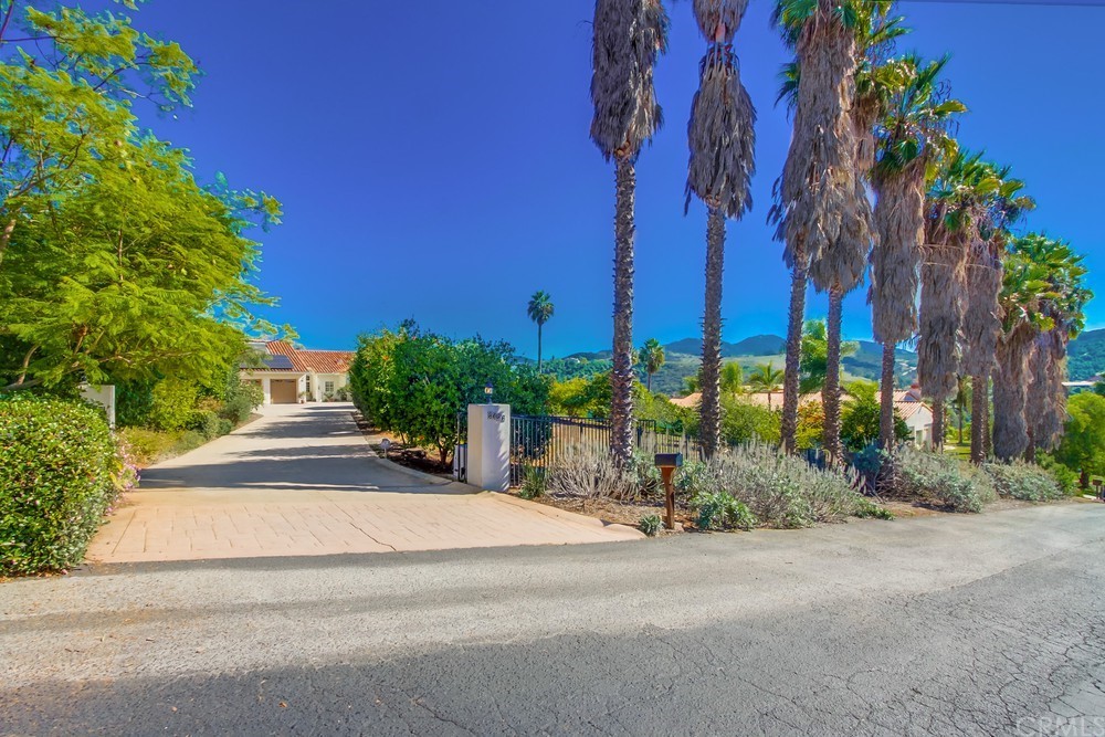 3036 Southwind Lane Vista, CA 92084 - Photo 2 of 45 front view of a house with a street