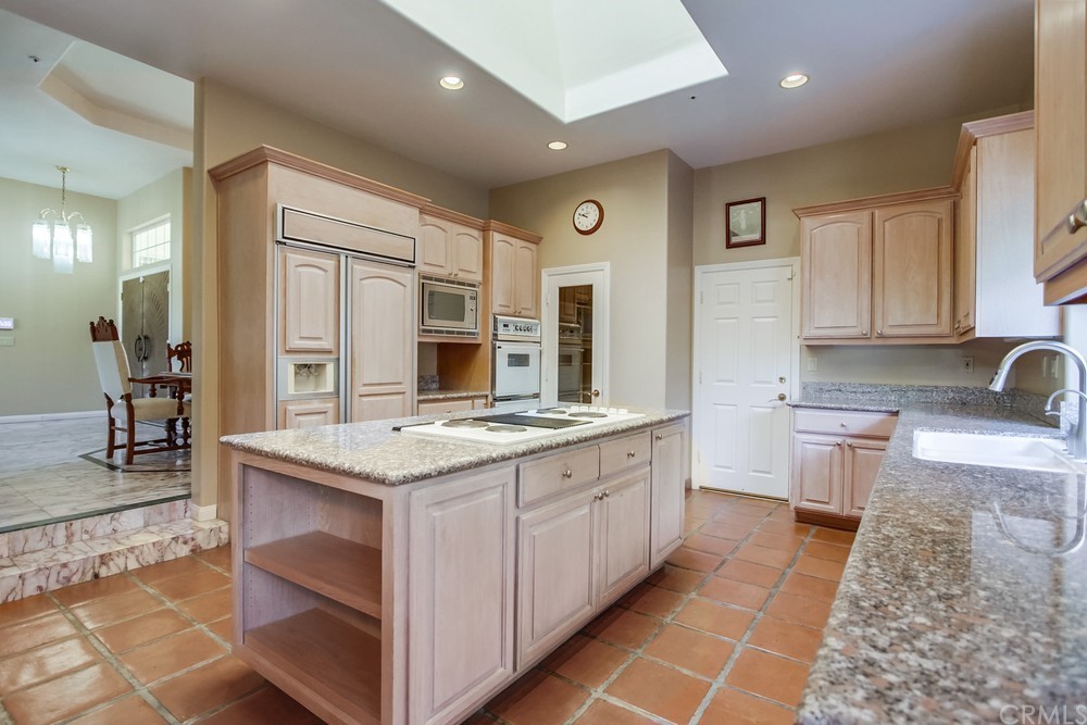 3036 Southwind Lane Vista, CA 92084 - Photo 21 of 45 a kitchen with a stove and a sink