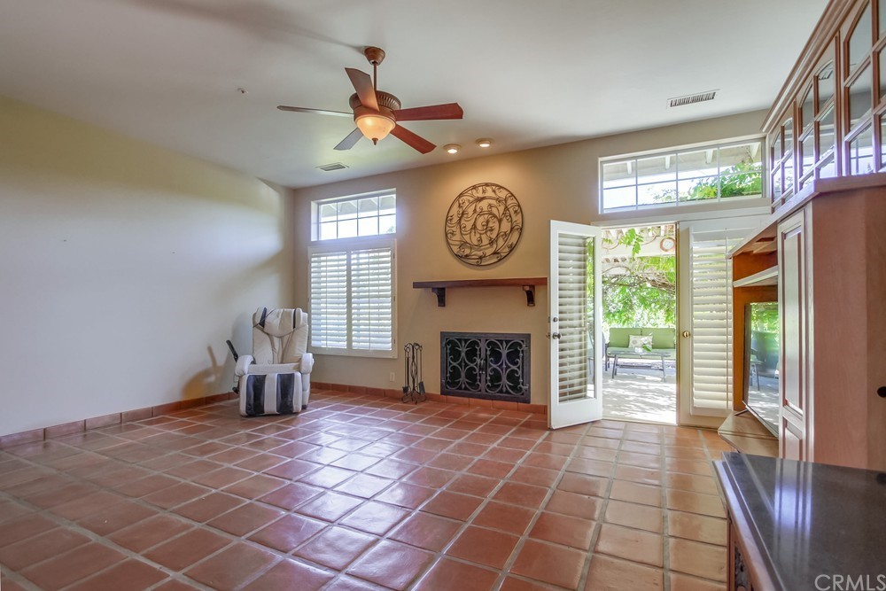 3036 Southwind Lane Vista, CA 92084 - Photo 22 of 45 a view of a livingroom with a fireplace and a window