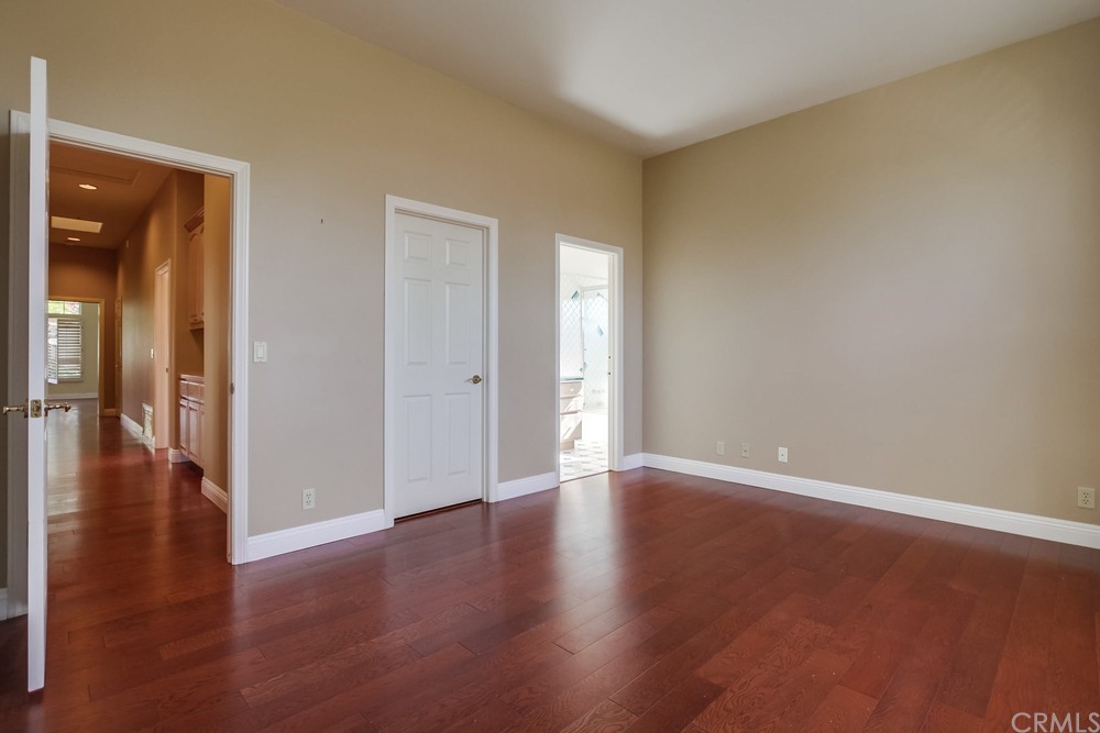 3036 Southwind Lane Vista, CA 92084 - Photo 32 of 45 a view of an empty room and wooden floor