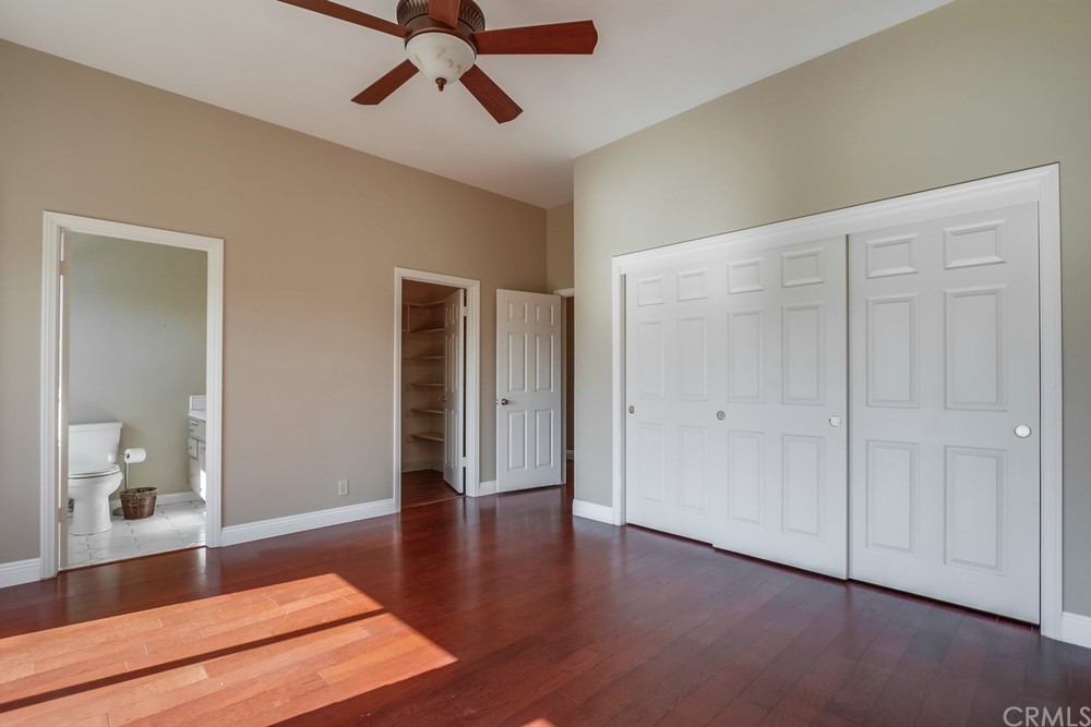 3036 Southwind Lane Vista, CA 92084 - Photo 35 of 45 a view of a room with wooden floor and white walls