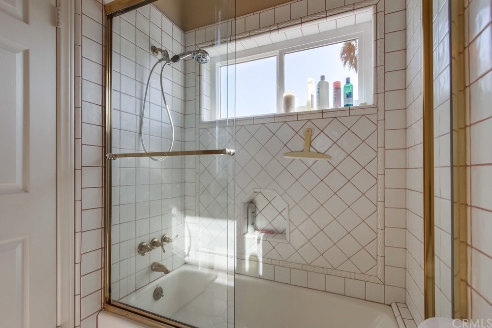 3036 Southwind Lane Vista, CA 92084 - Photo 36 of 45 a bathroom with a shower