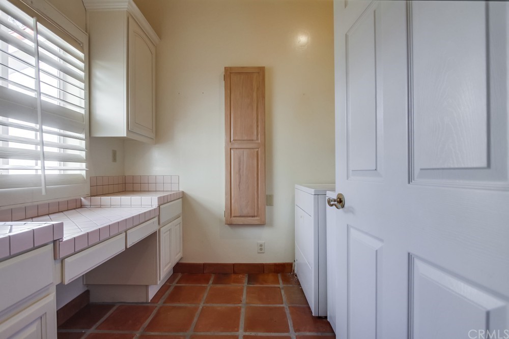 3036 Southwind Lane Vista, CA 92084 - Photo 39 of 45 a room with storage and utility