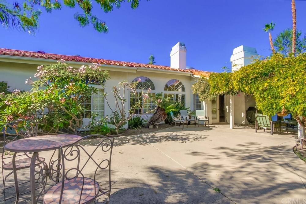 3036 Southwind Lane Vista, CA 92084 - Photo 40 of 45 a view of a chairs and table in the patio
